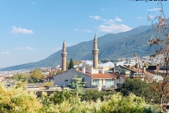 A view of Bursa's Grand Mosque (Ulucami) and Grand Mountain (Uludag) from Tophane.